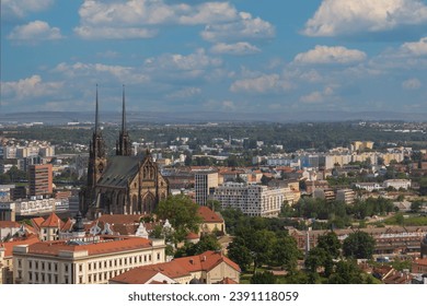 View of the city of Brno in the Czech Republic in Europe from the Špilberk viewpoint. The dominant feature of Brno is the Cathedral of St. Peter - Petrov. There is a beautiful sky in the background.​