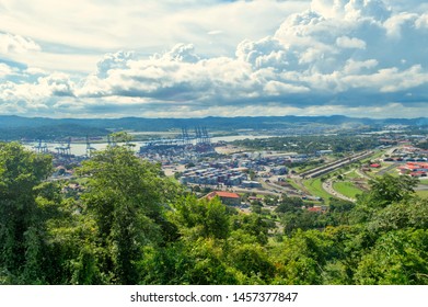 View Of City And Canal Of Panama From The Hill Ancon. Beautiful Panoramic View From Cerro Ancón In Panama. Mountains And Blue Sky With Clouds On The Horizon