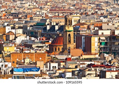 View of the city, with the church and bell tower (Barcelona city, Catalonia, Spain, Europe)