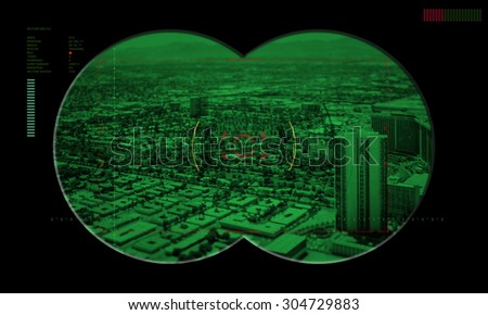view of a city in the crosshairs night vision device of terrorism 