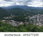 View of city of Gatlinburg with mountains in background in Gatlinburg, TN- June 5, 2015