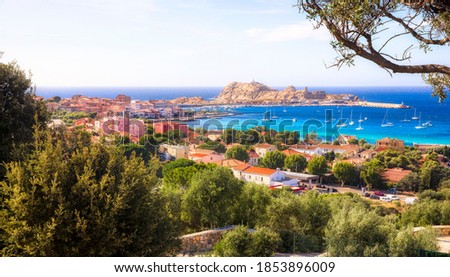 View of the City of L'Ile Rousse on Corsica, France, with Ile de la Pietra at a Distance