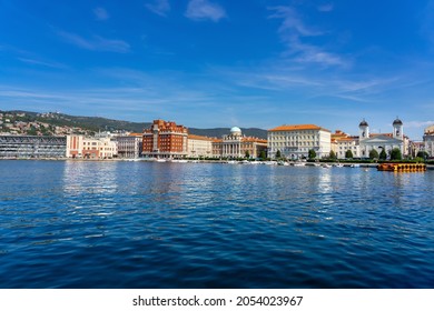 view of the city from molo audace pier in Trieste with beautiful buildings cityscape skyline shore - Shutterstock ID 2054023967