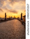 View of the city of Prague and the Vltava river with Old Town Bridge Tower on  Charles bridge  in Prague, Czech Republic.