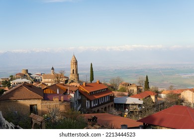 View Of The City Of Sighnaghi And The Alazani Valley In Warm Colors At The Golden Hour In Spring