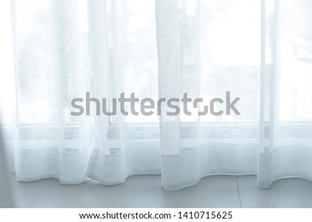 view cityscape looking pass Translucent white fabric curtains and outdoor terrace, city, thailand