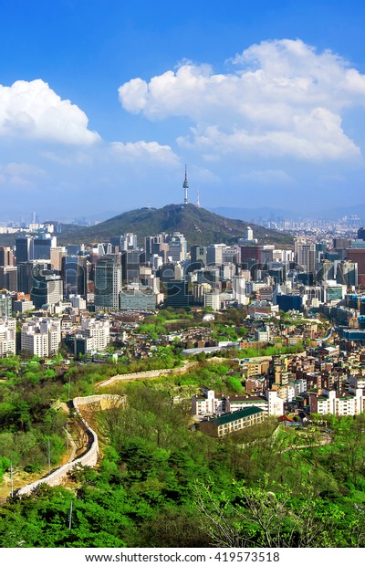 View\
of cityscape and Seoul tower in Seoul, South\
Korea.