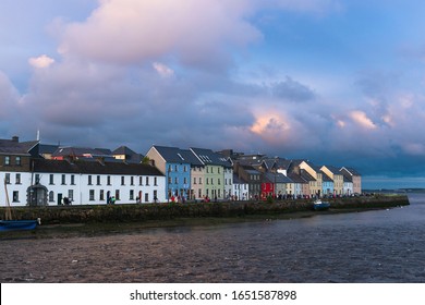 View from Claddagh of The Long Walk and Old Quays at dusk, Galway city, Ireland.