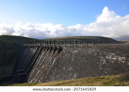 a view of Claerwen dam from the top of the dam
