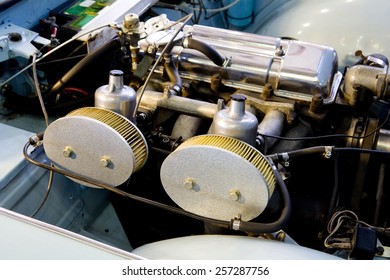 View Of A Classic Car Engine With Twin Carburetor. 
Classic Car Engine.