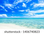 View of the clear turquoise waters of Kaneohe Bay as seen from the iconic sandbar in Oahu, Hawaii with the famous Chinamen