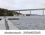 A view of Cleddau Bridge crossing Milford Haven from a pontoon at Burton Ferry, Pembrokeshire, Wales, UK.