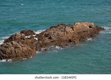 view of cliffs with birds