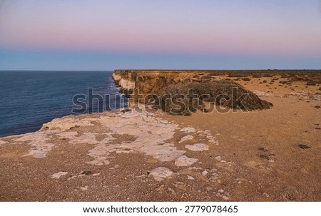 A view of the cliffs and ocean at Great Australian Bight Marine Park during twilight