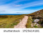 The view to the cliffs at The Old Man of Hoy  sea stack on Hoy, part of the Orkney archipelago off the north coast of Scotland