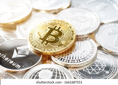 View close up of cryptocurrencies with a golden bitcoin, Litecoin, Ethereum. Blockchain technology.