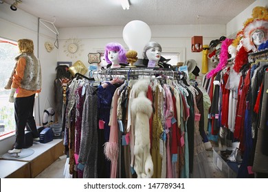 View Of Clothing And Wigs In A Crowded Second Hand Store