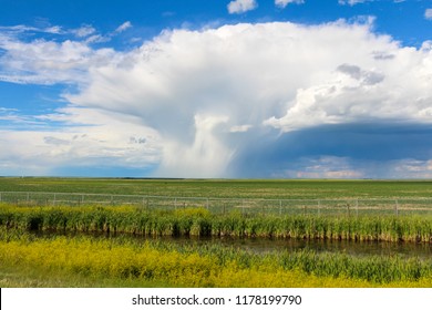 View of cloudburst and rainfall over plain lands