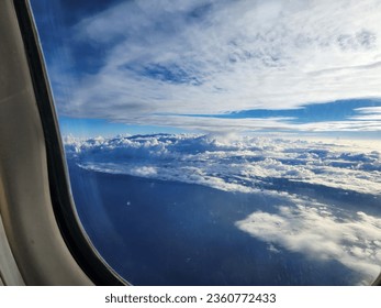view of clouds from airplane window 