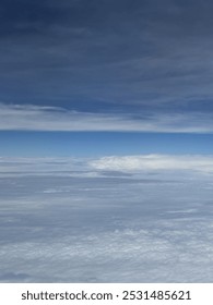 View of Clouds from an Airplane Window