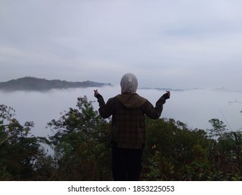 view of the clouds on a hill