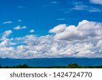 View Of Clouds Over Landscape