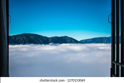 View of Clouds from a Window