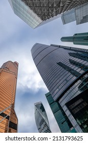 View Up The Cloudy Sky And Modern Skyscrapers In The Business Center Of Moscow City In The City Of Moscow