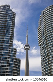 View of CN Tower between two condominiums in downtown Toronto, Canada