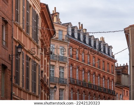 View of colorful ancient brick buildings in the historic center of the 