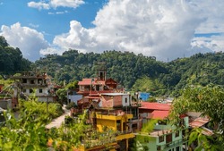 View Of Colorful Buildings Surrounded By Green Mountains, Kathmandu, Nepal