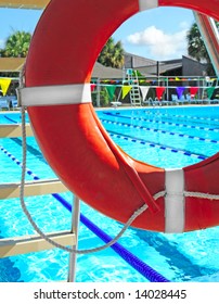 View Of Community Swimming Pool Through Lifeguard Ring