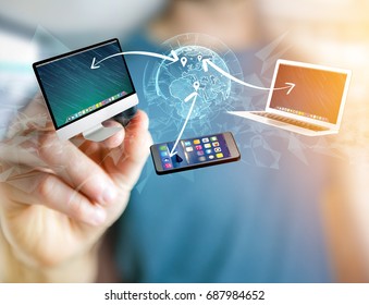 View of a Computer and devices displayed on a futuristic interface with interantional network - Multimedia and technology concept