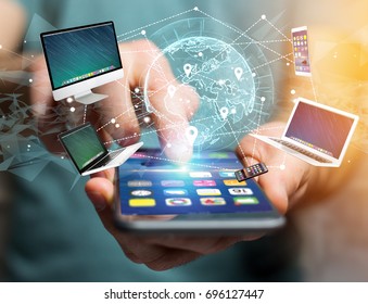 View of a Computer and devices displayed on a futuristic interface with interantional network - Multimedia and technology concept
