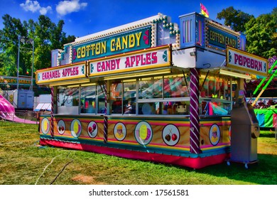 View Of Concession Stand Of Cotton Candy And Caramel Apples At A Carnival.