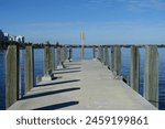 View of a concrete pier on the waterfront of the Swan river in the city of Perth in WA Australia
