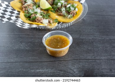 A View Of A Condiment Cup Of Salsa.