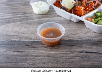 A View Of A Condiment Cup Of Shatta.