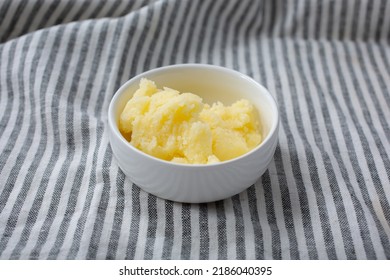 A View Of A Condiment Cup Of Solidified Ghee.