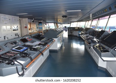 View Of The Control Console On The Navigational Bridge Of The Cargo Ship. 