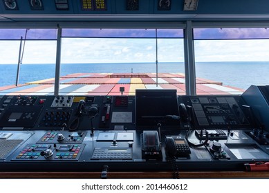 View of the control console on the navigational bridge of the cargo container ship.  - Shutterstock ID 2014460612
