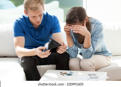 View Of Couple Having Not Enough Money