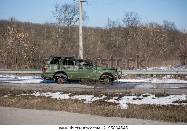 View of crashed
Range Rover car in the highway. Broken car. Automobile crash.
Damaged car after collision. Auto accident. Risks on the Road.
21.03.2022, Kharkiv,
Ukraine

