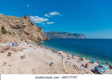 View Of The Crimea Beach And Cape Aya With Tourists