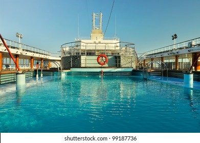 View Of The Cruise Ship Deck With Luxurious Pool And Spa Area