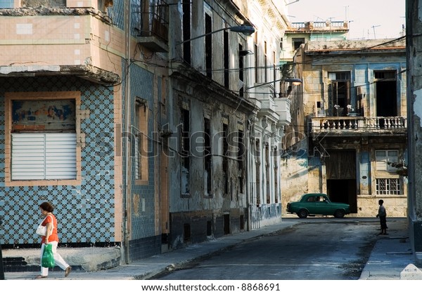 A view of crumbling\
buildings in Havana