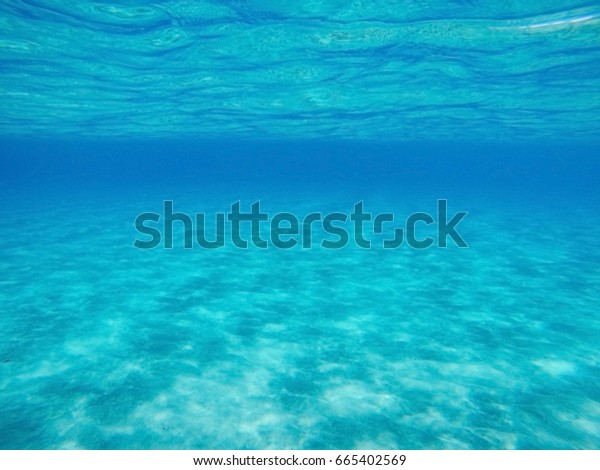 View Crystal Blue Ocean Water Ocean Stock Photo Edit Now 665402569