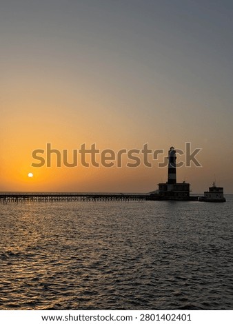 A view of Daedalus Reef Lighthouse at sunset