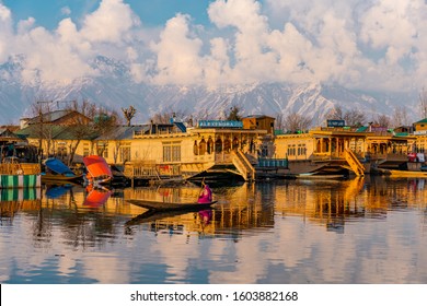 View of  Dal lake  and boat house before sunset in the heart of Srinagar during winter  , Srinagar , Kashmir , India - January 13 , 2019 