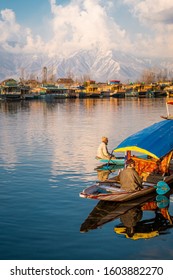 View of  Dal lake  and boat house before sunset in the heart of Srinagar during winter  , Srinagar , Kashmir , India - January 13 , 2019 